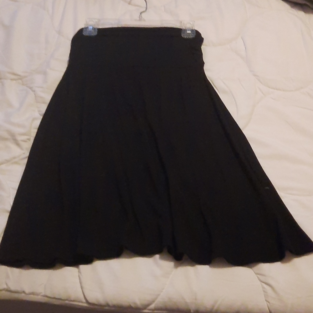 Two Gnw knee length skirts
